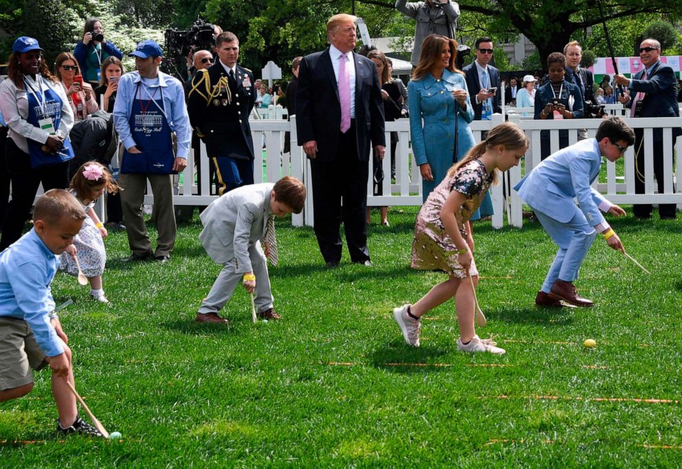 PHOTO: President Donald Trump and First Lady Melania Trump look on during the annual White House Easter Egg Roll, April 22, 2019. 