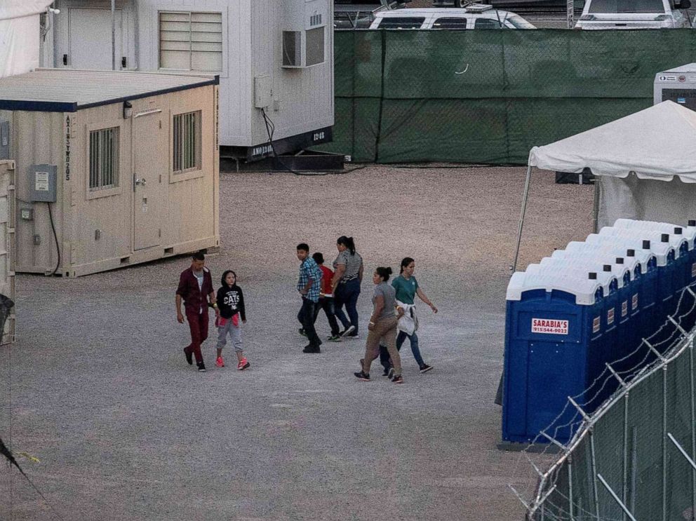 PHOTO: Immigrants held in a temporary facility set up to hold them at the El Paso Border Patrol Station, June 21, 2019.