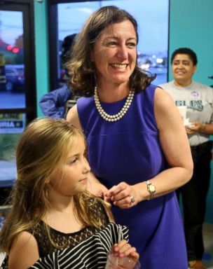 PHOTO: Elaine Luria stands with her daughter Violette Blondin after winning the Democratic nomination for Virginias 2nd Congressional District in Virginia Beach, Va., June 12, 2018.