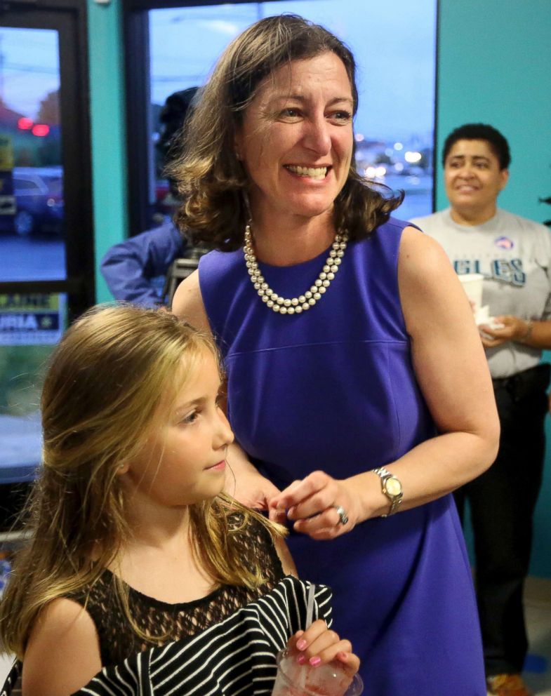 PHOTO: Elaine Luria stands with her daughter Violette Blondin after winning the Democratic nomination for Virginia's 2nd Congressional District in Virginia Beach, Va., June 12, 2018.
