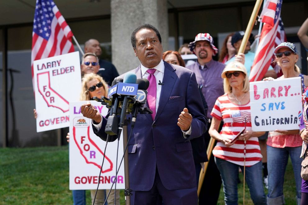 PHOTO: In this July 13, 2021, file photo, radio talk show host Larry Elder speaks to supporters during a campaign stop in Norwalk, Calif.