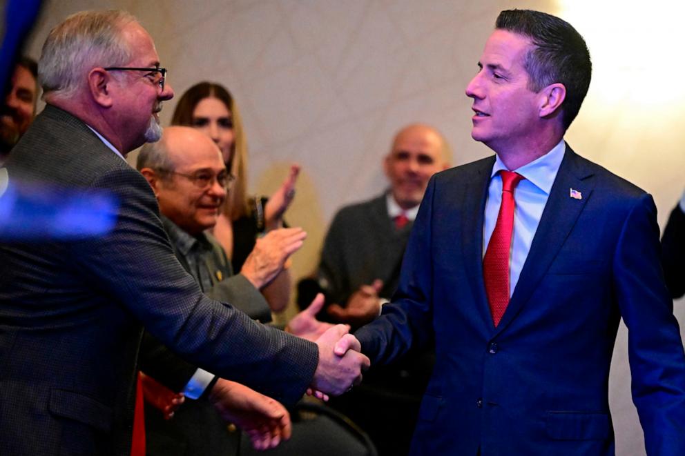 PHOTO: Cleveland businessman Bernie Moreno, a Republican candidate for U.S. Senate shakes hands with a supporter during his primary election night watch party in Westlake, Ohio, March 19, 2024. 