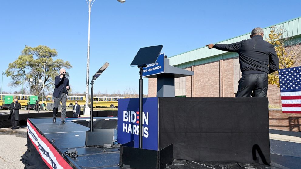 PHOTO: Former US President Barack Obama introduces Democratic presidential candidate Joe Biden at a campaign event in Flint, Mich., Oct. 31, 2020.