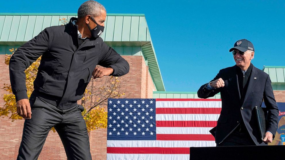 PHOTO: Former US President Barack Obama joins Democratic presidential candidate Joe Biden at a campaign event in Flint, Mich., Oct. 31, 2020.