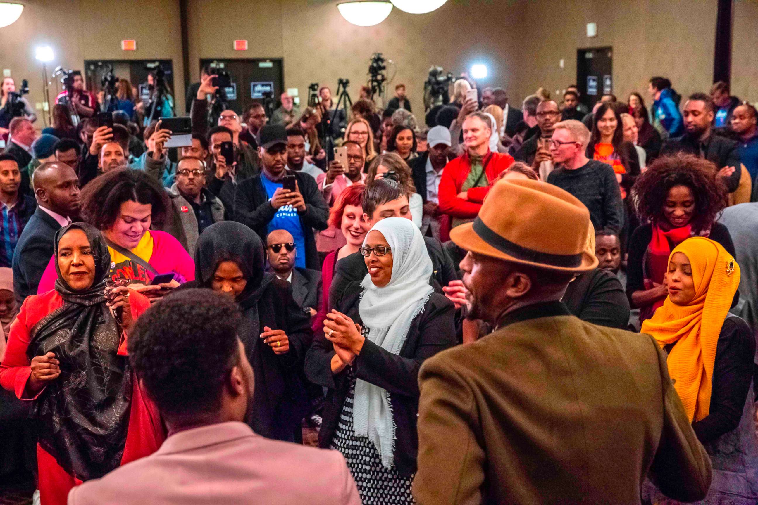 PHOTO: Supporters of Democratic congressional candidate, Ilhan Omar, center, celebrate  in Minneapolis, Nov. 6, 2018.