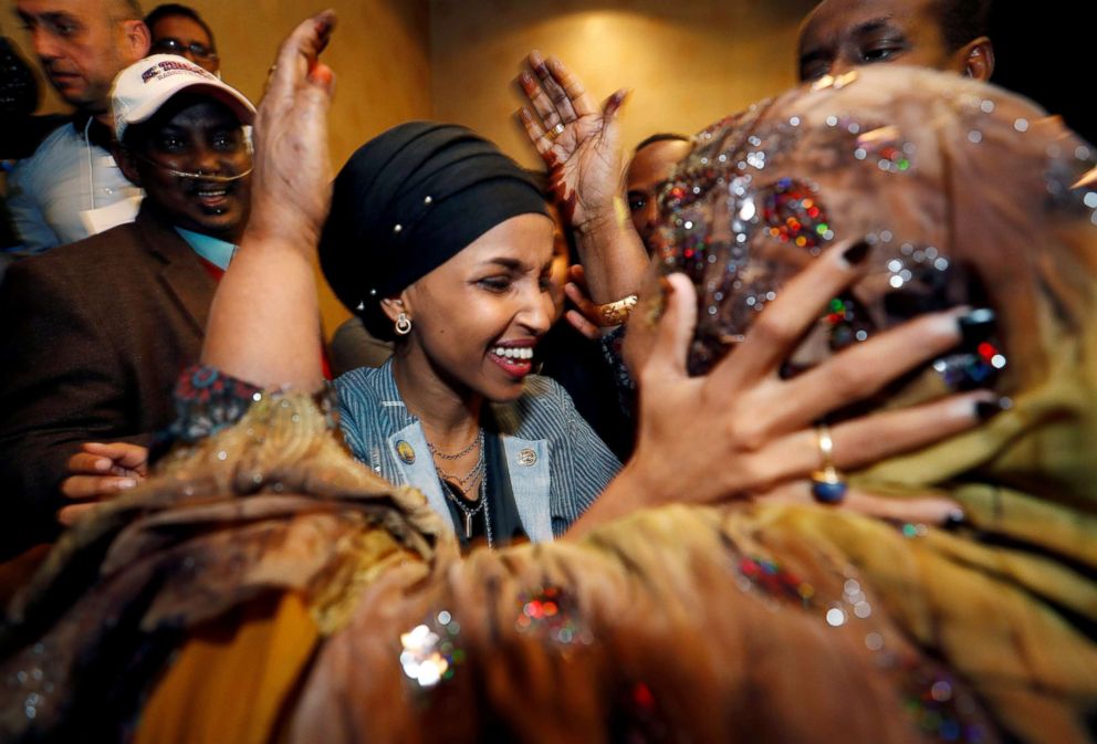 PHOTO: Democratic congressional candidate Ilhan Omar is greeted by her husband's mother after appearing at her midterm election night party in Minneapolis, Nov. 6, 2018.