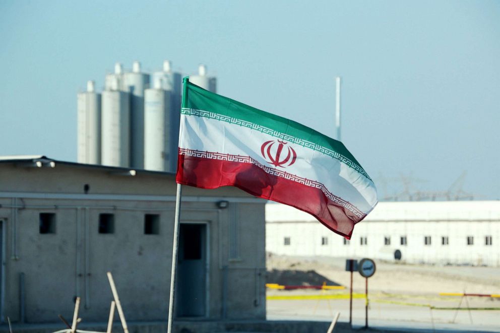 PHOTO: An Iranian flag flies at Iran's Bushehr nuclear power plant, during an official ceremony to kick-start works on a second reactor at the facility, Nov. 10, 2019.