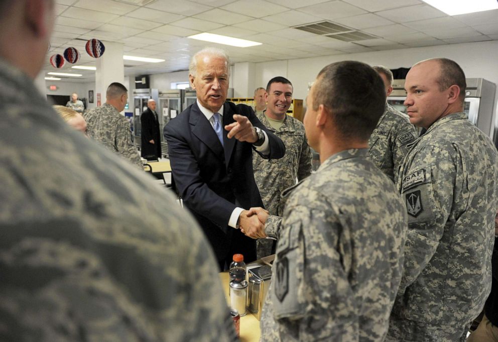 PHOTO: US Vice President Joe Biden shakes hands with US soldiers at Bagram airbase, some 50 km north of Kabul, Jan. 12, 2011.