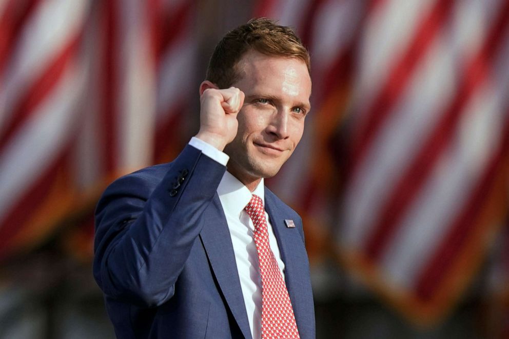 PHOTO: Max Miller pumps his fist before speaking at a rallyin Wellington, Ohio, June 26, 2021.