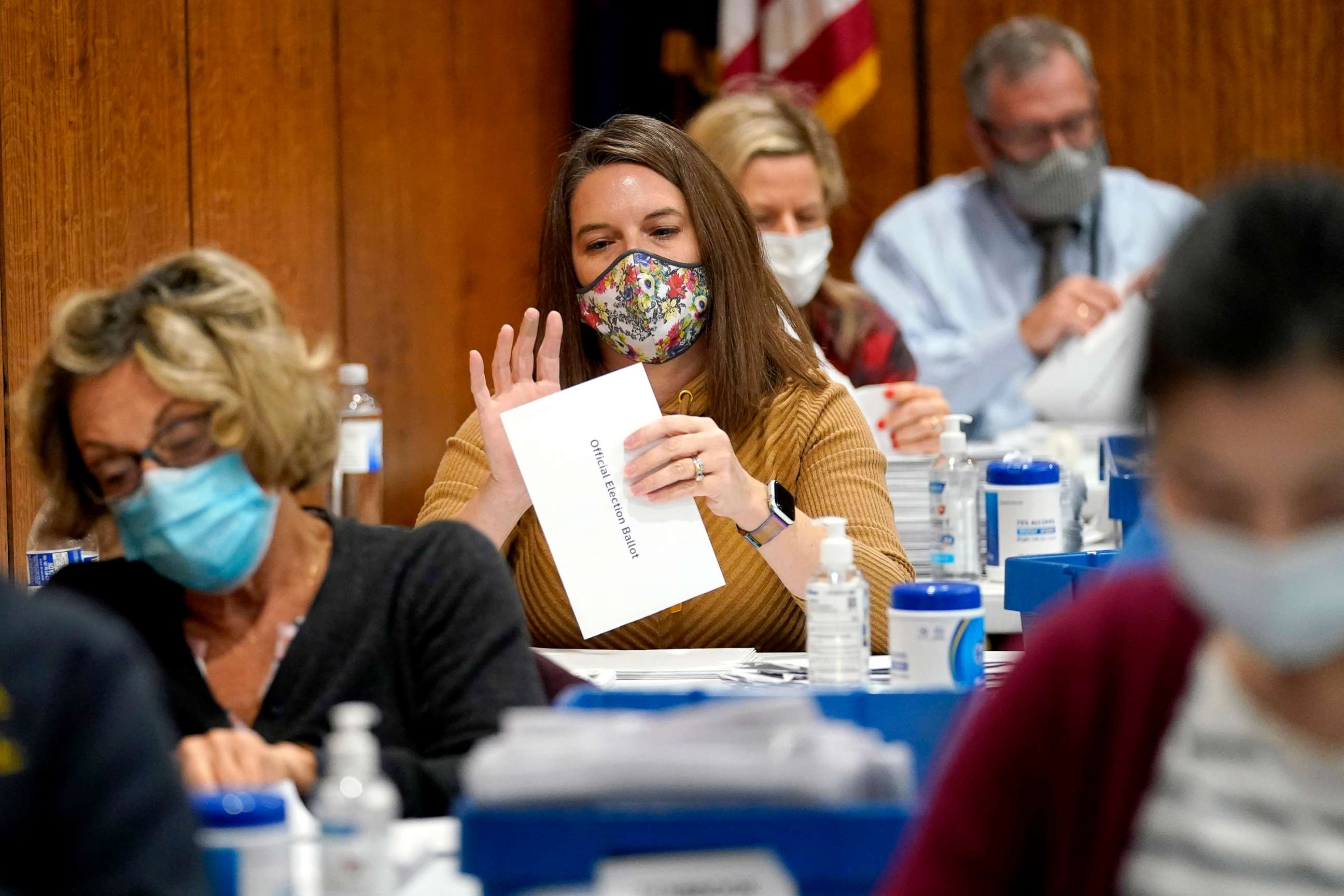 PHOTO: An election worker opens up a mail-in ballot before it is counted in the 2020 general election at the Dauphin County Administration Building, Nov. 3, 2020, in Harrisburg, Pa.