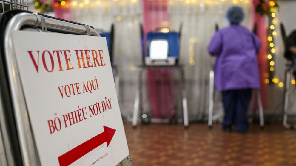 PHOTO: In this March 1, 2022, file photo, a "Vote Here" sign appears at a polling location during the primary elections in Fort Worth, Texas.
