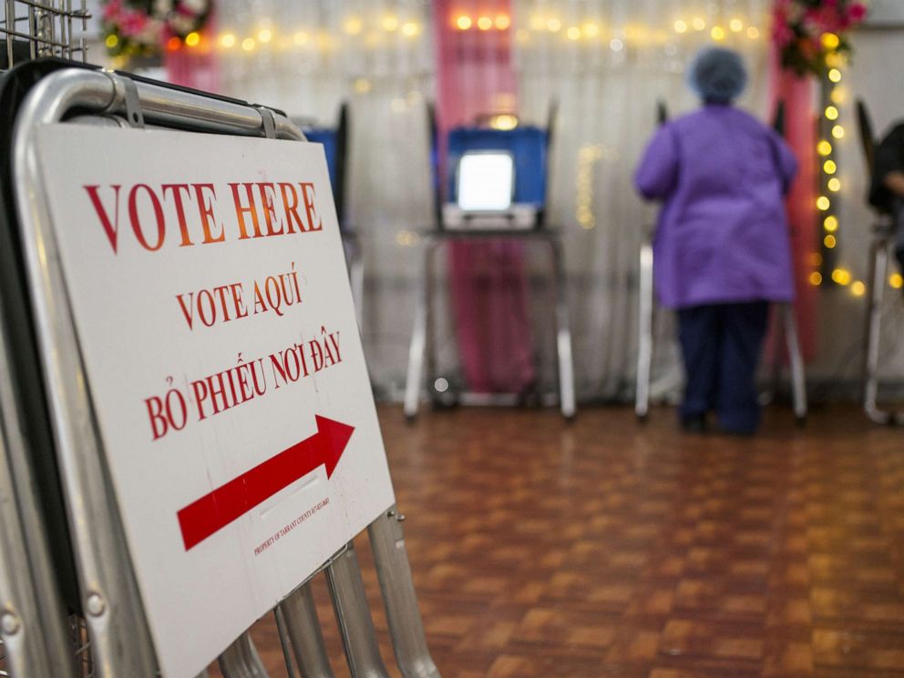 PHOTO: In this March 1, 2022, file photo, a "Vote Here" sign appears at a polling location during the primary elections in Fort Worth, Texas.