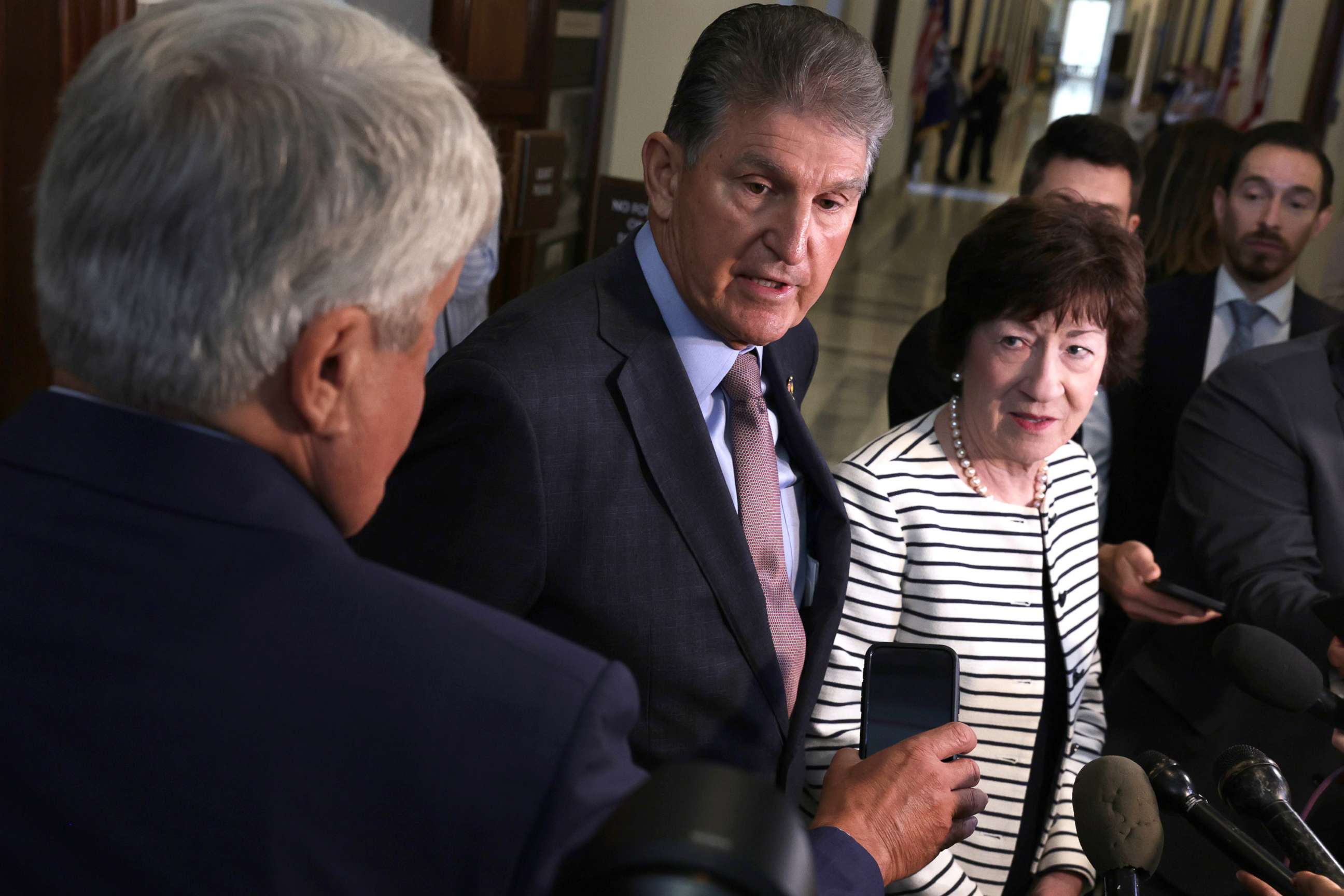 PHOTO: Sen. Joe Manchin and Sen. Susan Collins speak to members of the media after they testified at a hearing on the Electoral Count Act before Senate Rules and Administration Committee at Russell Senate Office Building in Washington, D.C., Aug. 3, 2022.