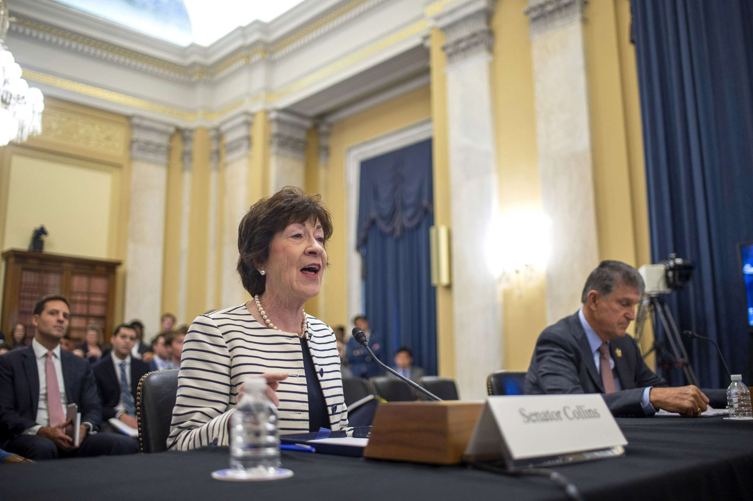 PHOTO: Sen. Susan Collins speaks as Sen. Joe Manchin looks on during a Senate Rules and Administration hearing examining on reforming the Electoral Count Act at the U.S. Capitol in Washington, D.C., Aug. 3, 2022.