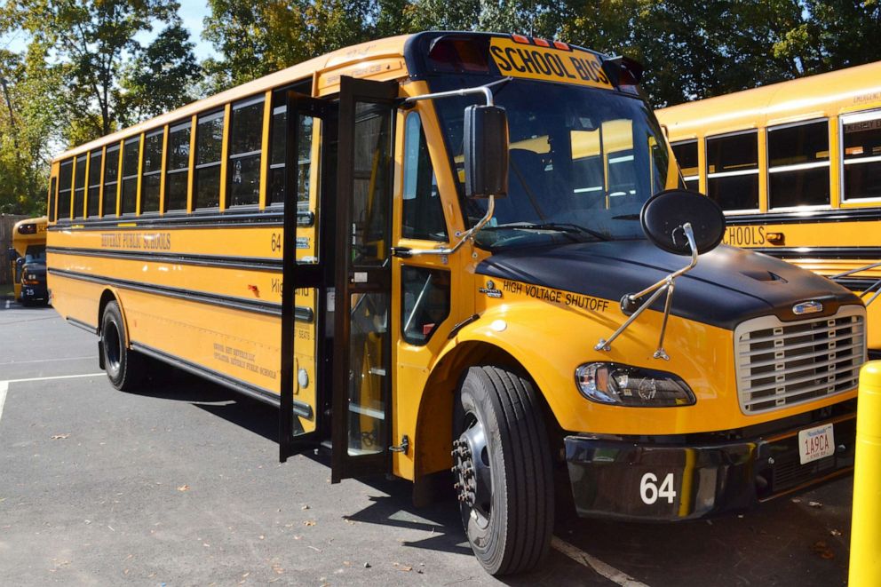 PHOTO: An electric school bus, leased by Beverly Public Schools in Beverly, Mass., rests in a bus yard, Oct. 21, 2021, in Beverly, Mass.