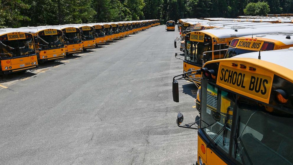 PHOTO: Montgomery County Public Schools aims to transition its more than 1,400 school buses, some seen here on Feb. 25, 2019, to electric-powered vehicles within a decade.