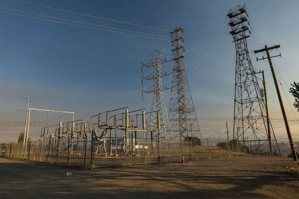 PHOTO: Transmission towers alongside a Pacific Gas & Electric Co. substation in Crockett, Calif., Aug. 19, 2020.