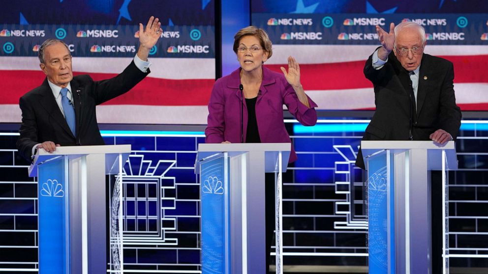 PHOTO: Michael Bloomberg, Sen. Elizabeth Warren and Sen. Bernie Sanders speak during the Democratic presidential debate at the Paris Theater in Las Vegas, Feb. 19, 2020.