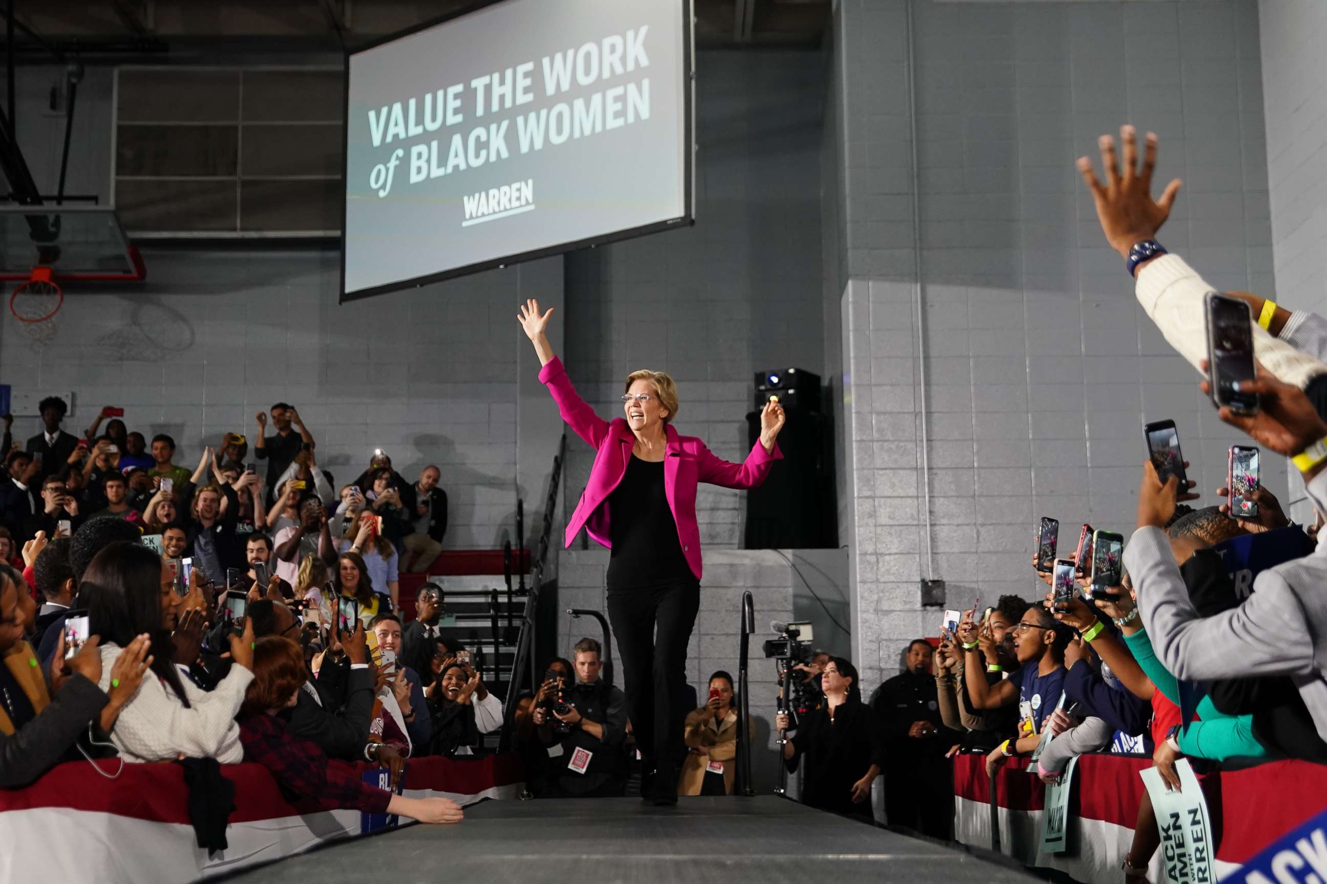 PHOTO: Sen. Elizabeth Warren, D-Mass., arrives on stage at a campaign event at Clark Atlanta University on Nov. 21, 2019, in Atlanta. 