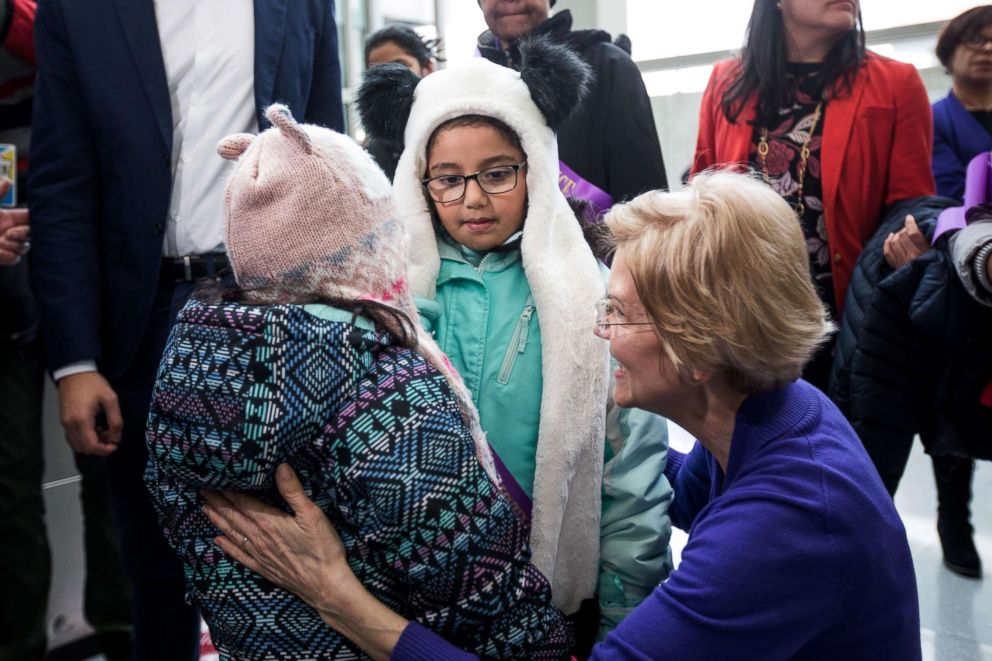 PHOTO: Sen. Elizabeth Warren greets two children after a rally for airport workers affected by the government shutdown at Boston Logan International Airport, Jan. 21, 2019, in Boston.