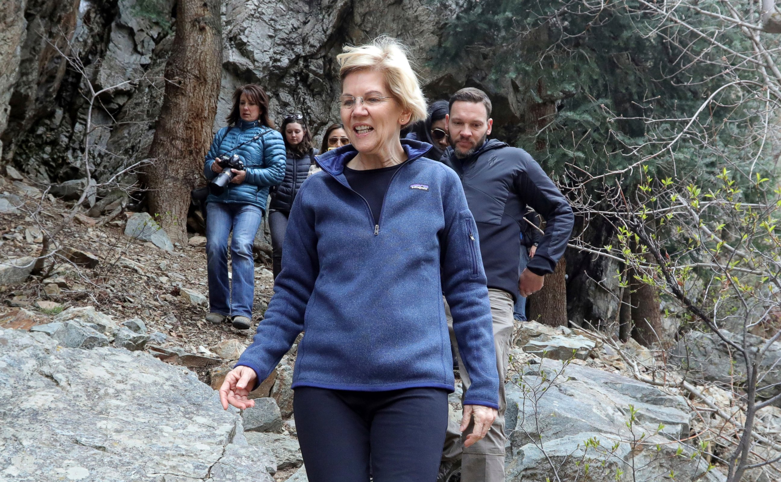 PHOTO: Democratic presidential candidate Sen. Elizabeth Warren, D-Mass., walks with Carl Fisher, of Save Our Canyons, during an visit to Big Cottonwood Canyon Wednesday, April 17, 2019, east of Salt Lake City.