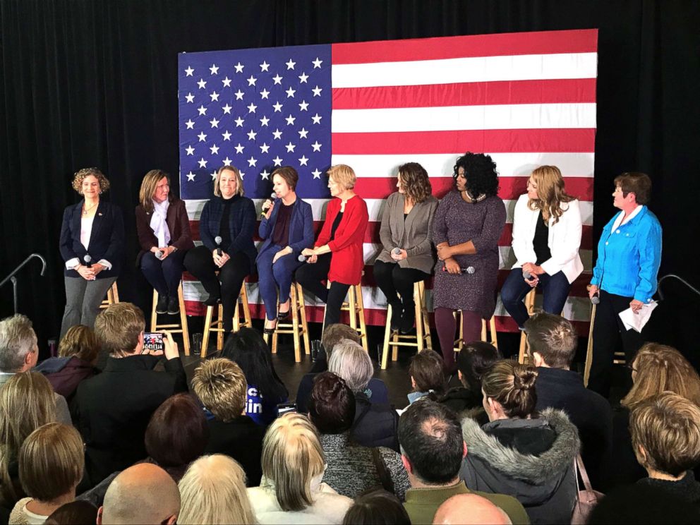 PHOTO: Amber Gustafson, candidate for Iowa State Senate, incoming State Reps. and candidate for Iowa Secretary of State Deirdre DeJear  sit around Sen. Elizabeth Warren at a roundtable event in Ankeny, Iowa, Jan. 6, 2019.