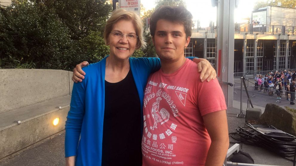 PHOTO: Nathan Wall, 16, takes a photo with Sen. Elizabeth Warren of Massachusetts after waiting in the "selfie" line for almost three hours in Seattle after her largest 2020 campaign event to date on Sunday, Aug. 25, 2019.