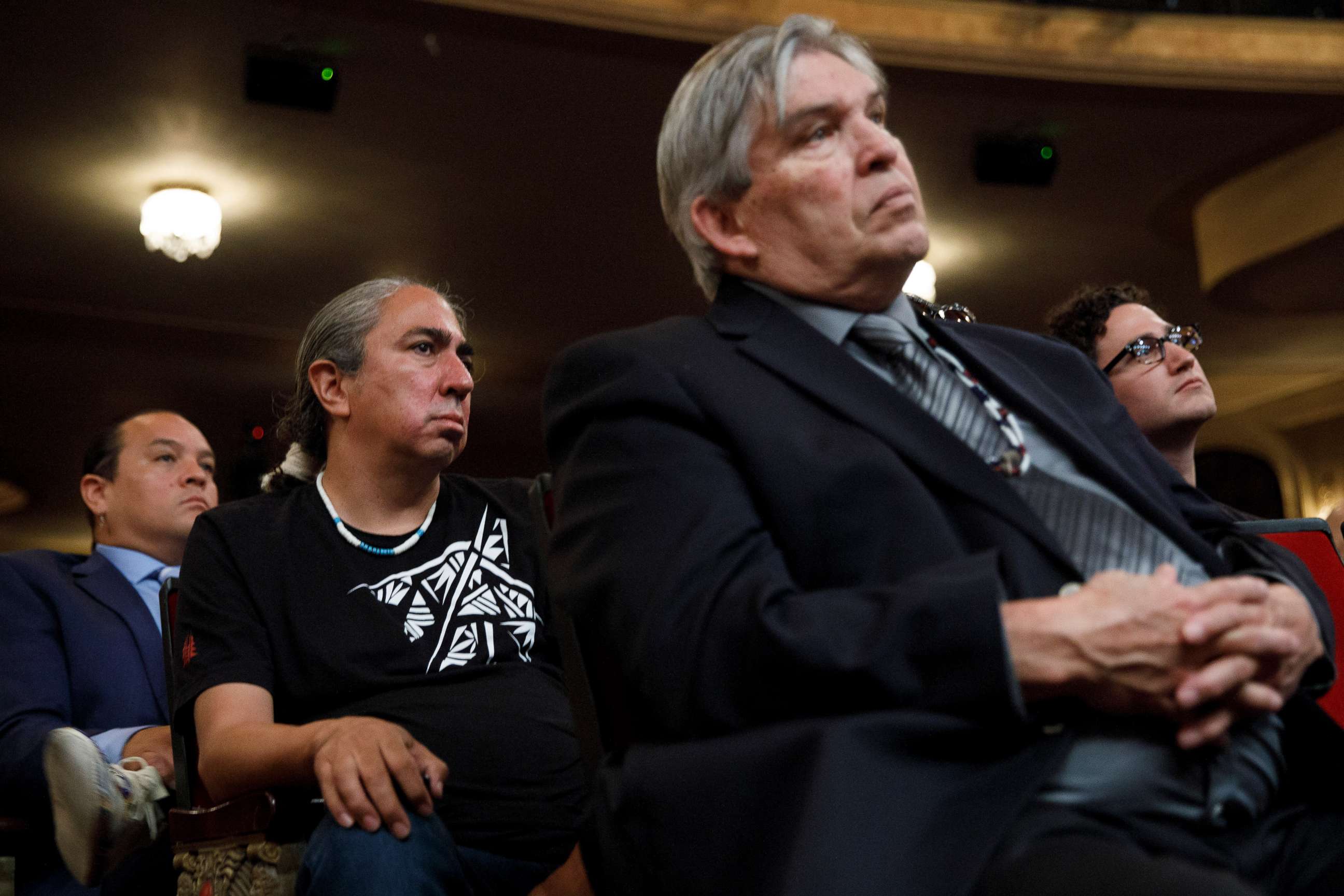 PHOTO: Audience members watch as Sen. Elizabeth Warren takes questions from a panel during a presidential forum on Native American issues in Sioux City, Iowa, Aug. 19, 2019.
