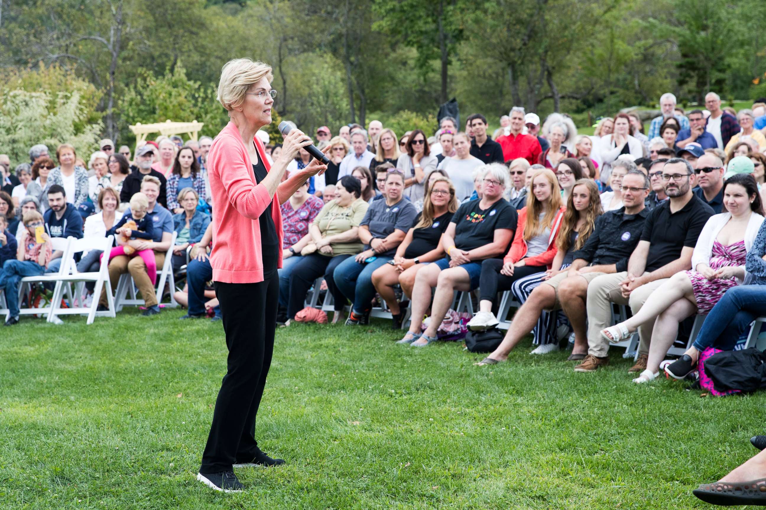 PHOTO: Sen. Elizabeth Warren speaks to a crowd at a Labor Day house party, Sept. 2, 2019, in Hampton Falls, New Hampshire.