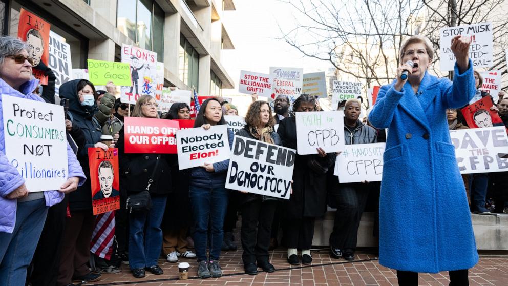 PHOTO: Senator Elizabeth Warren, D-Mass., speaks during a protest against President Donald Trump and DOGE Elon Musk's anticipated plan to close the Consumer Financial Protection Bureau in front of the CFPB headquarters in Washington, D.C., Feb. 10, 2025. 