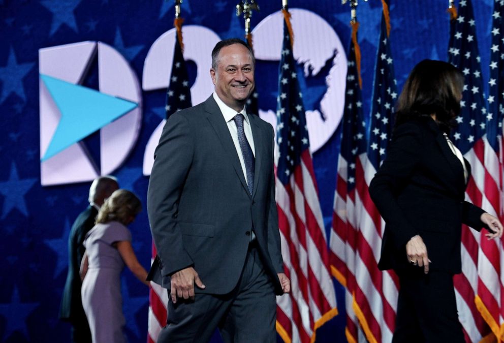 PHOTO: Douglas Emhoff and Democratic vice presidential nominee Kamala Harris walk of stage on the fourth day of the Democratic National Convention at the Chase Center in Wilmington, Del., Aug. 20, 2020.