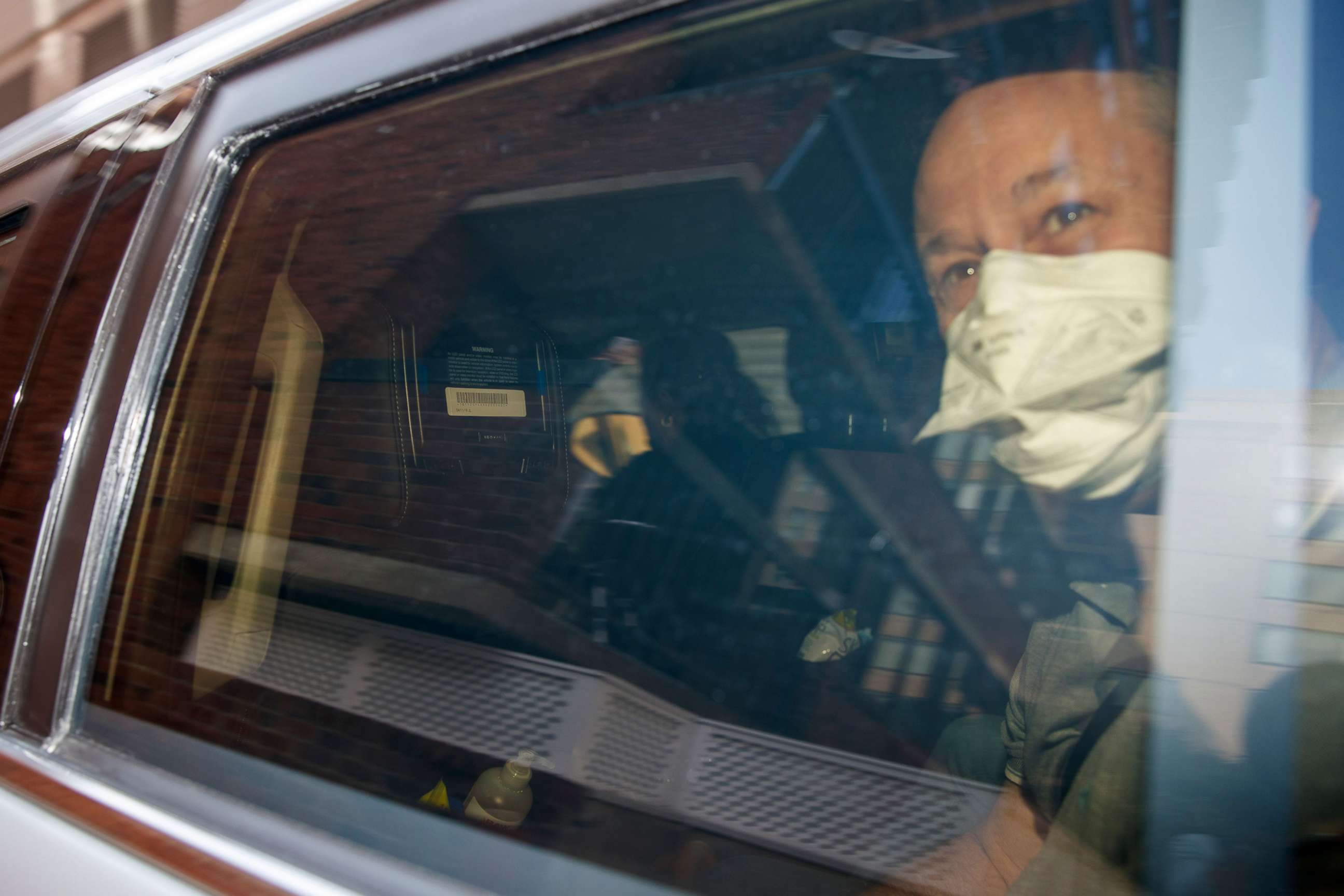 PHOTO: Douglas Emhoff, the husband of Democratic vice presidential candidate and Senator Kamala Harris, looks out the window as they depart their home in Washington, D.C., Aug. 12, 2020.