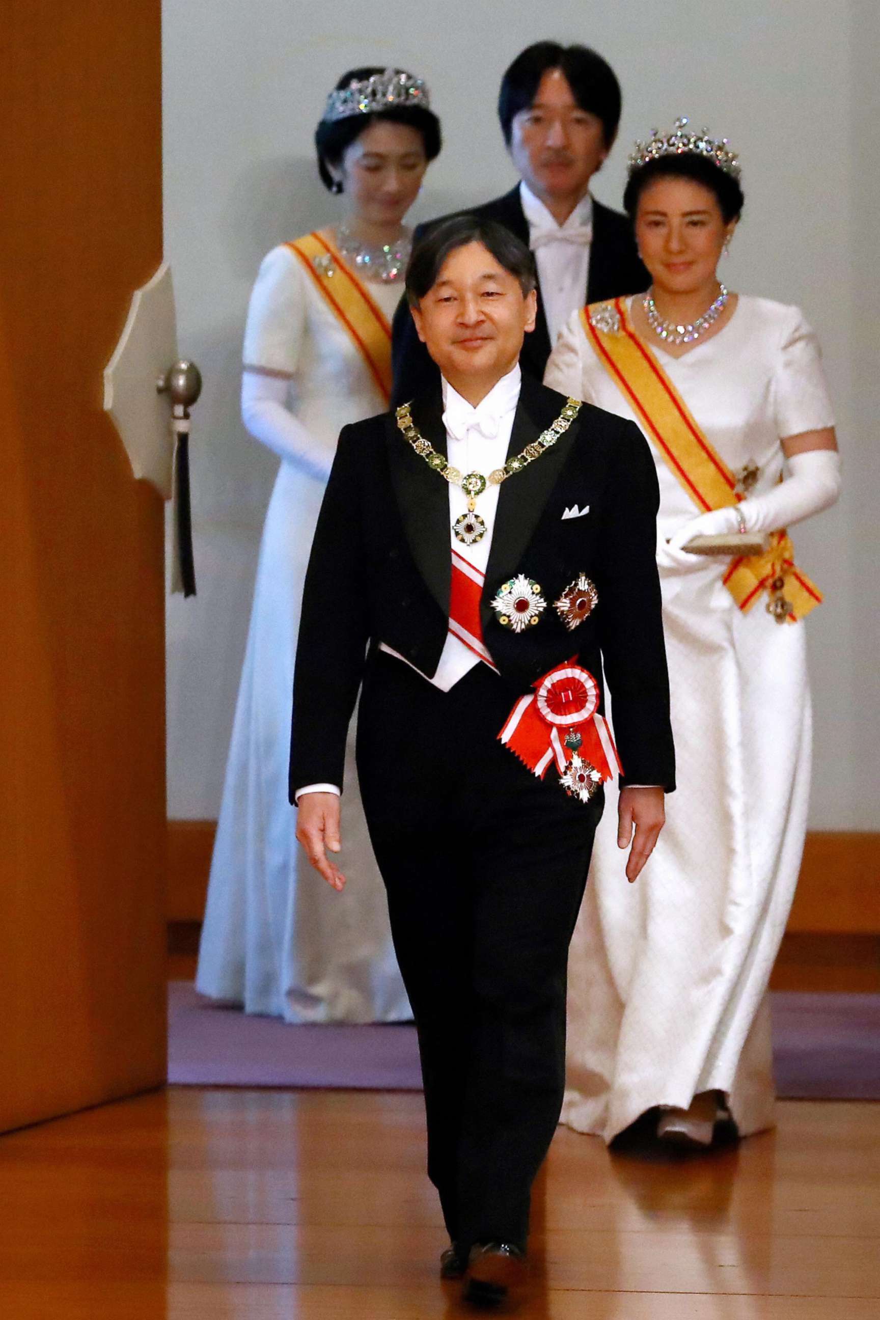 PHOTO: New Emperor Naruhito, Empress Masako, Crown Prince Akishino and Crown Princess Kiko of Akishino enter the Matsu-no-Ma hall after his accession to the Chrysanthemum Throne at the Imperial Palace on May 1, 2019, in Tokyo, Japan.