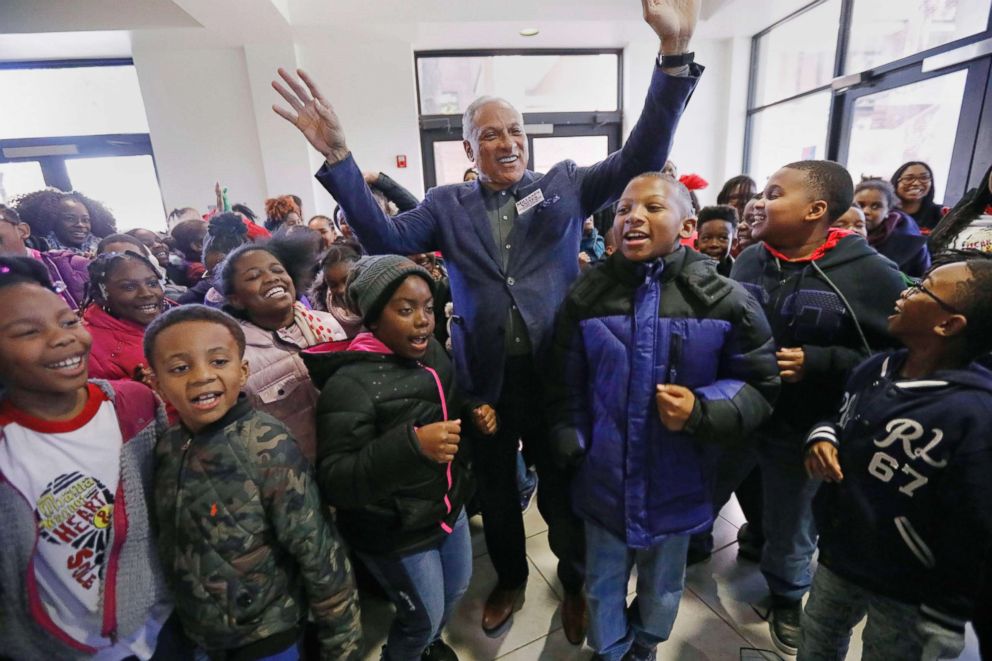 PHOTO: Students from the Barack H. Obama Magnet Elementary School in Jackson, Miss., shout their support with candidate Mike Espy, center, at the Millsaps College Student Union in Jackson, Miss., Nov. 15, 2018.