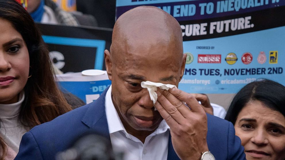 PHOTO: New York democratic mayoral candidate Eric Adams wipes his eyes as he speaks to the media and supporters upon leaving a voting center after casting his ballot, in Brooklyn, New York, on Nov. 2, 2021.