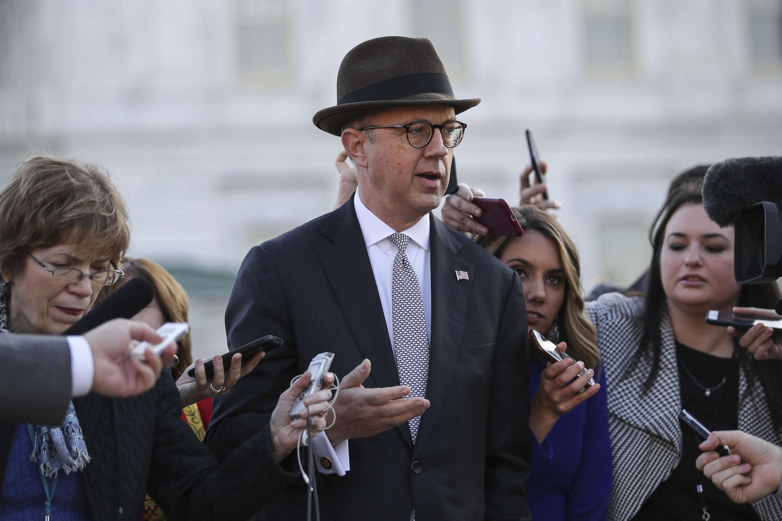 PHOTO: Reporters surround White House Legislative Affairs director Eric Ueland as he  exits the Capitol after meeting with Senate Majority Leader Mitch McConnell, R-Ky., on Dec. 12, 2019 in Washington.