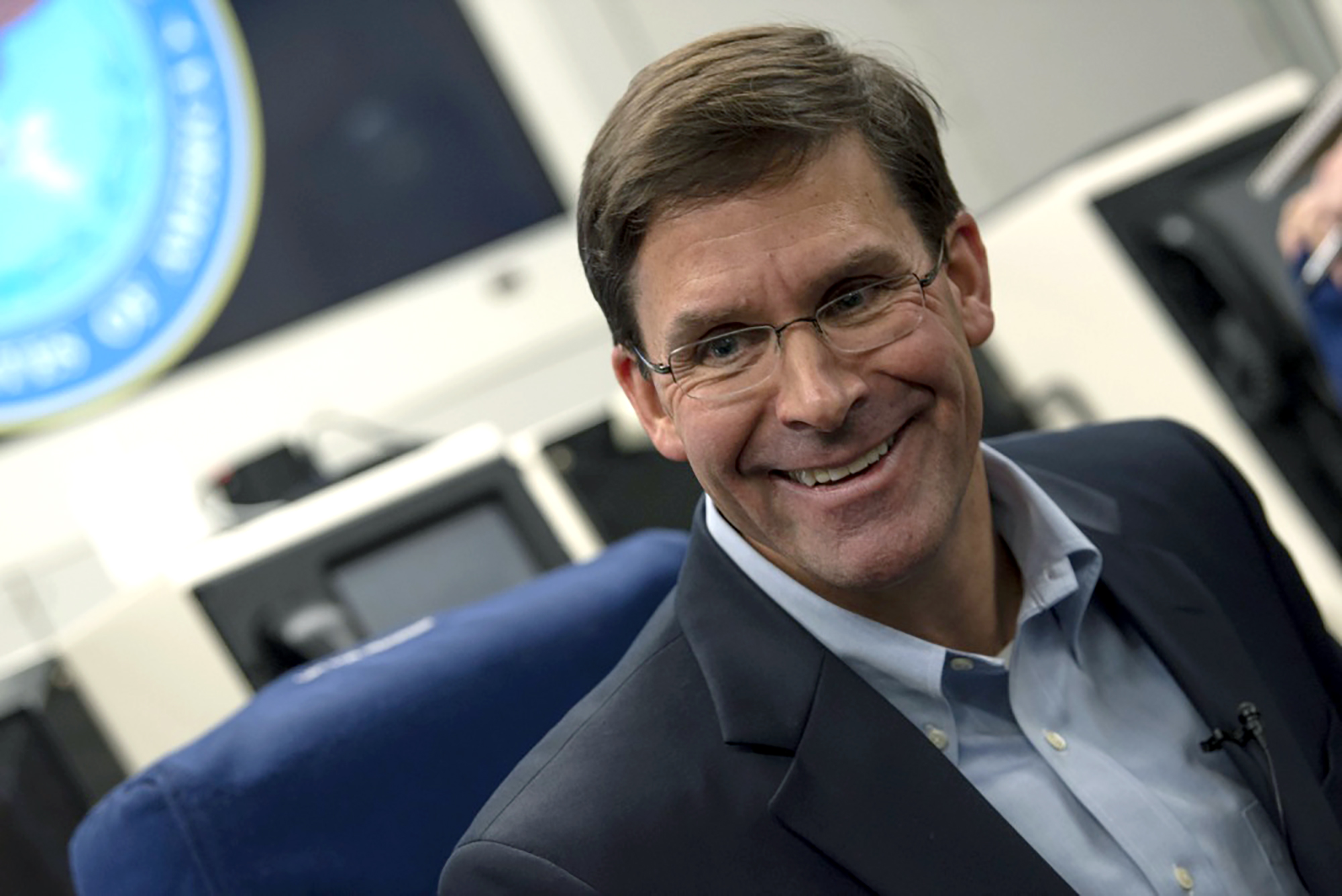 PHOTO: Acting Secretary of Defense Mark Esper speaks to reporters on a government aircraft en route to Brussels, Belgium, June 25, 2019.