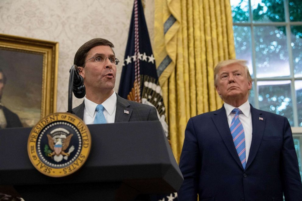 PHOTO: Defense Secretary Mark Esper speaks after he was sworn in as President Donald Trump looks on in the Oval Office at the White House in Washington, DC, July 23, 2019.