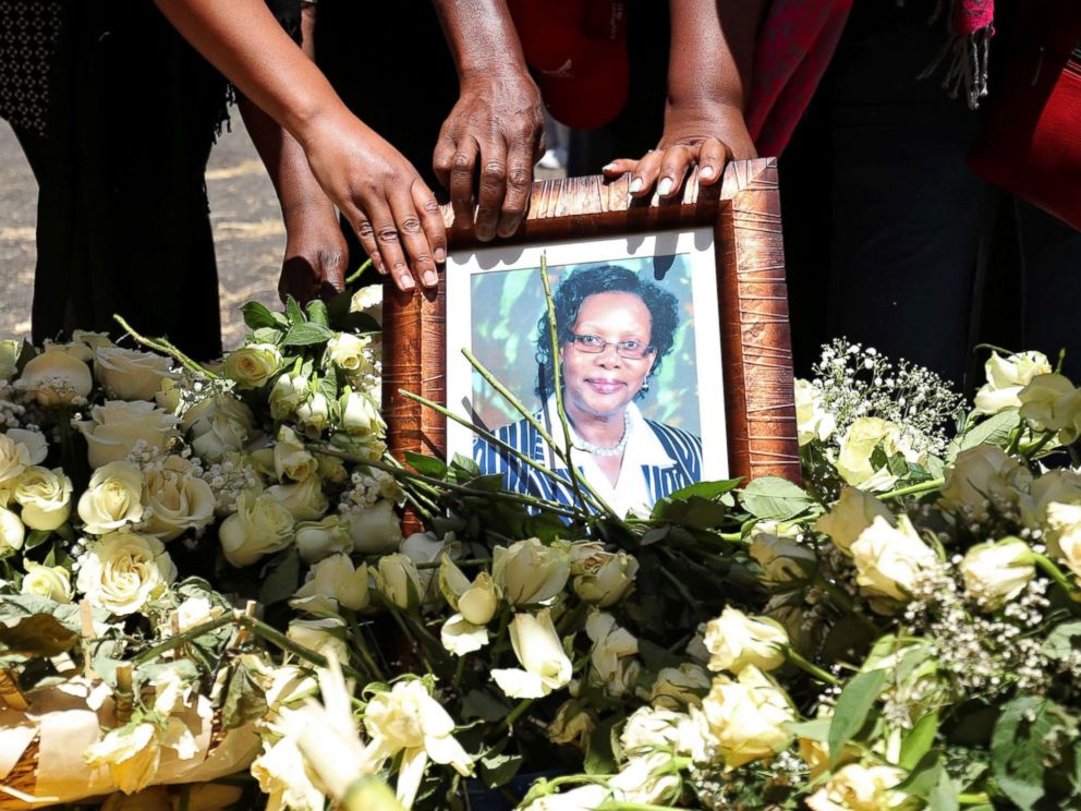 PHOTO: United Nations workers hold a portrait as they mourn their colleagues during a commemoration ceremony for the victims at the scene of the Ethiopian Airlines Flight ET 302 plane crash, near Addis Ababa, Ethiopia March 15, 2019.