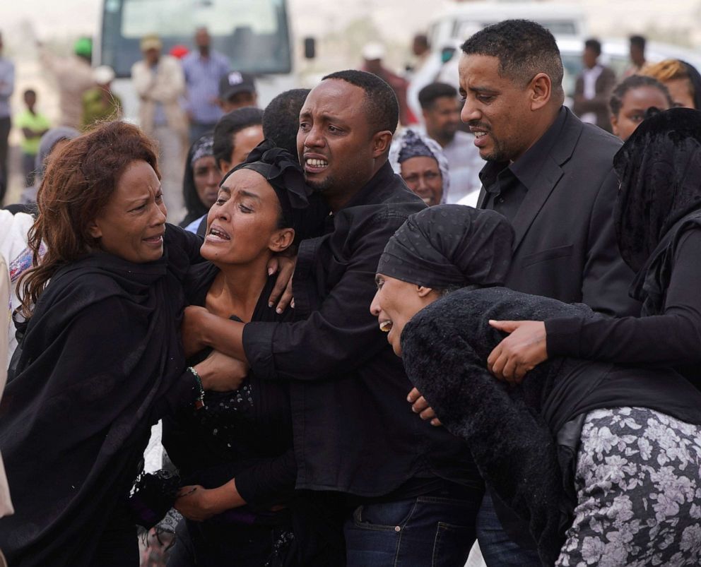 PHOTO: Mourners visit the crash site of Ethiopian Airlines Flight ET302 on March 14, 2019, in Ejere, Ethiopia.