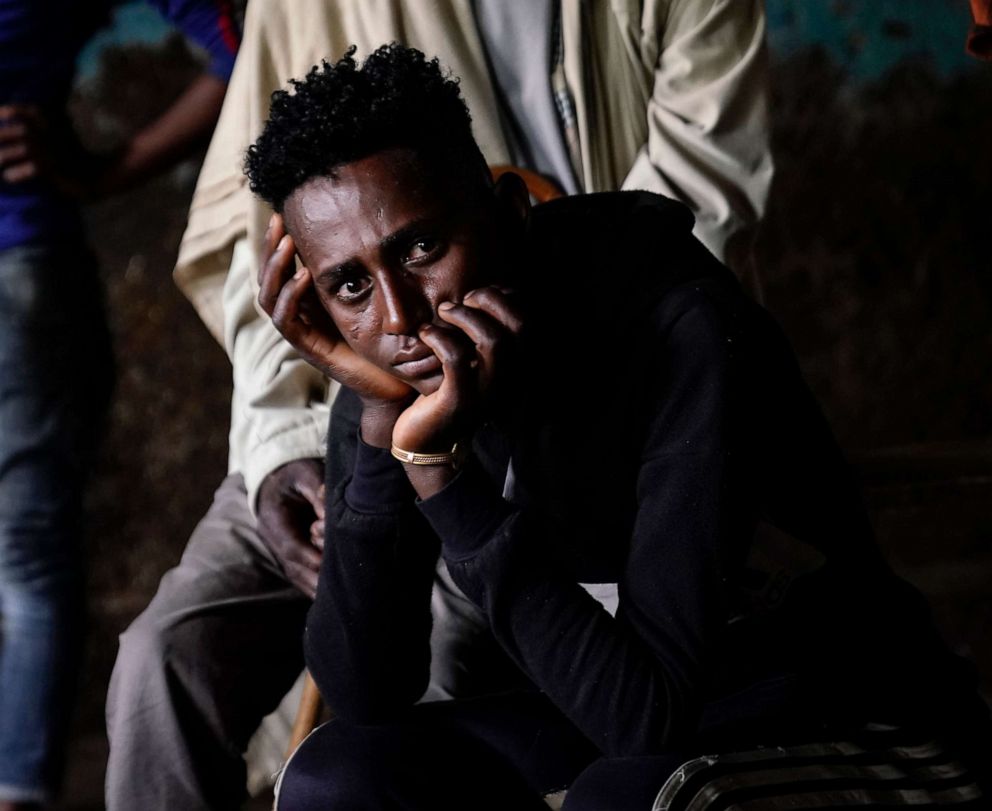 PHOTO: A young man who fled his home to escape forced conscription sits at the Ebanet Primary School on Oct. 8, 2021, in Ebenat, Ethiopia.