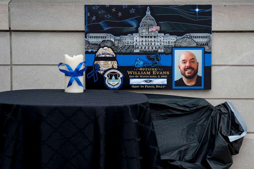 PHOTO: A memorial for Officer William Evans is displayed at the entrance to the U.S. Capitol grounds, April 13, 2021, in Washington, D.C.