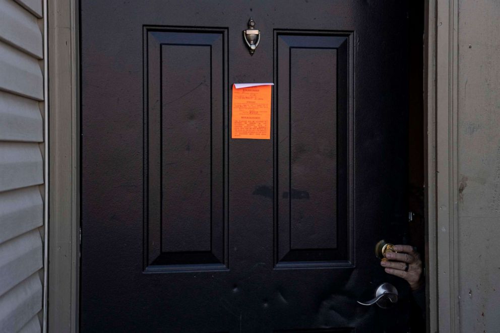 PHOTO: An eviction notice is posted and the lock is changed on a residence in the unincorporated community of Galloway, March 3, 2021, west of Columbus, Ohio. 
