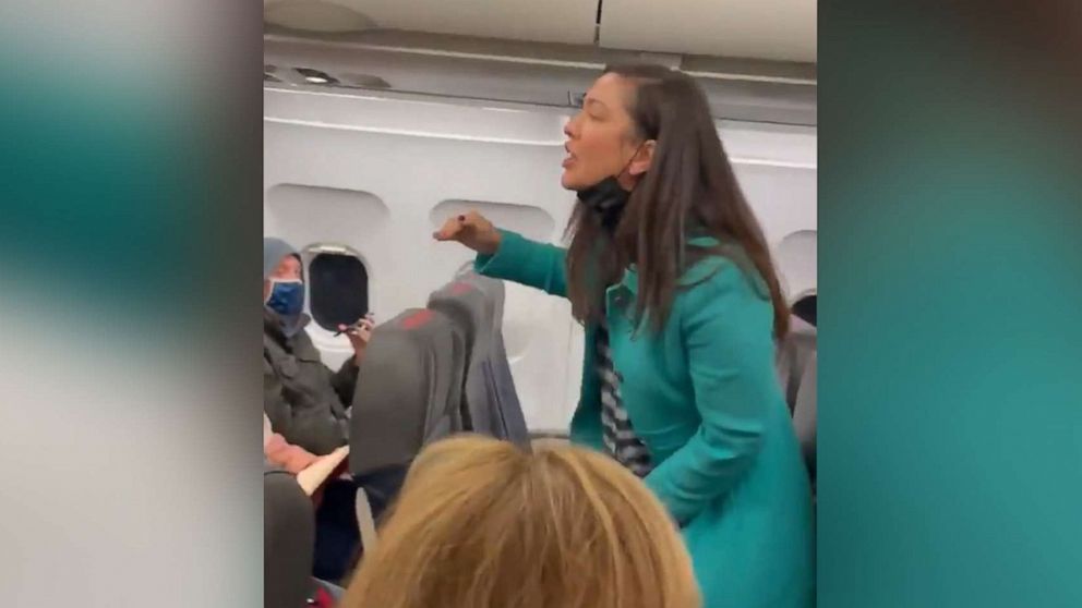 PHOTO: A woman flying from Charlotte to D.C. was filmed refusing to wear a mask and shouting in the aisle. American confirmed the woman is now banned from the airline pending further investigation, Jan. 10, 2020. 