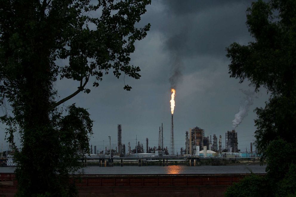 PHOTO: A gas flare from the Shell Chemical refinery is shown on August 21, 2019 in Norco, LA. The plant agreed to install $10 million in pollution monitoring and control equipment in 2018 to settle allegations flares were in violation of federal law.