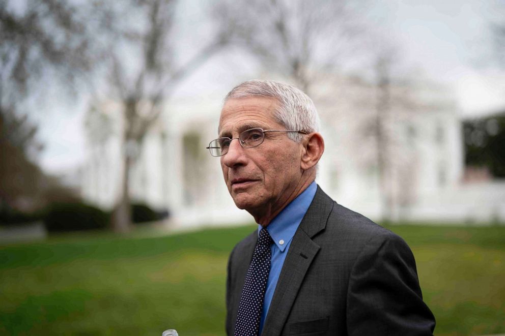 PHOTO: Dr. Anthony Fauci, Director at the National Institute of Allergy and Infectious Diseases at the National Institutes of Health, walks to a TV interview at the White House, March, 12, 2020.