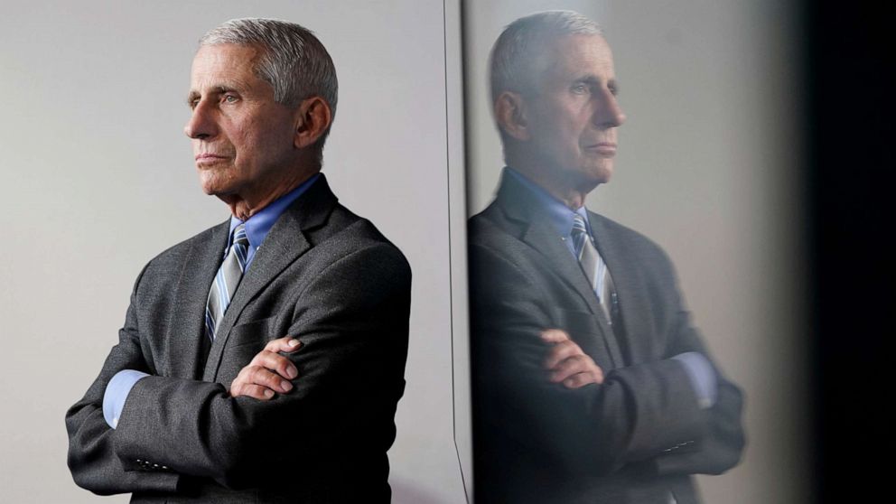 PHOTO: National Institute of Allergy and Infectious Diseases Director Dr. Anthony Fauci is reflected in a video monitor behind him on stage as he listens to the daily coronavirus task force briefing at the White House in Washington, April 8, 2020.