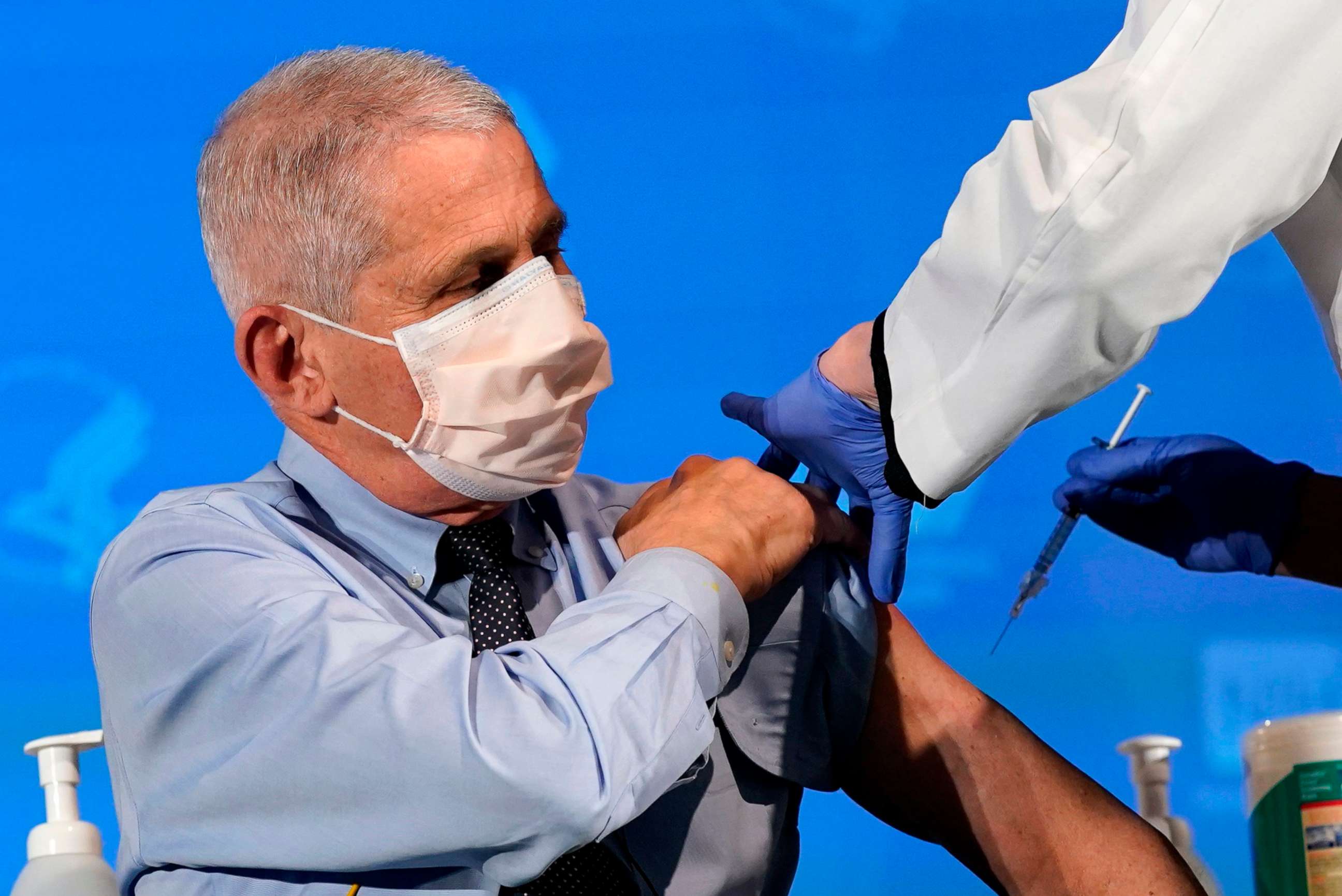 PHOTO: Anthony Fauci, director of the National Institute of Allergy and Infectious Diseases, prepares to receive his first dose of the Covid-19 vaccine at the National Institutes of Health, Dec. 22, 2020, in Bethesda, Maryland.