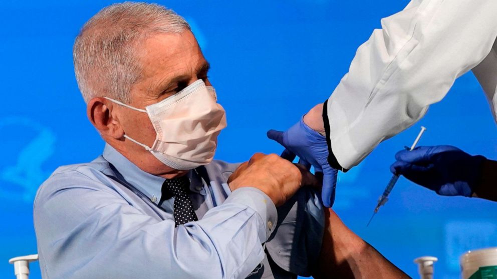 PHOTO: Anthony Fauci, director of the National Institute of Allergy and Infectious Diseases, prepares to receive his first dose of the Covid-19 vaccine at the National Institutes of Health, Dec. 22, 2020, in Bethesda, Maryland.