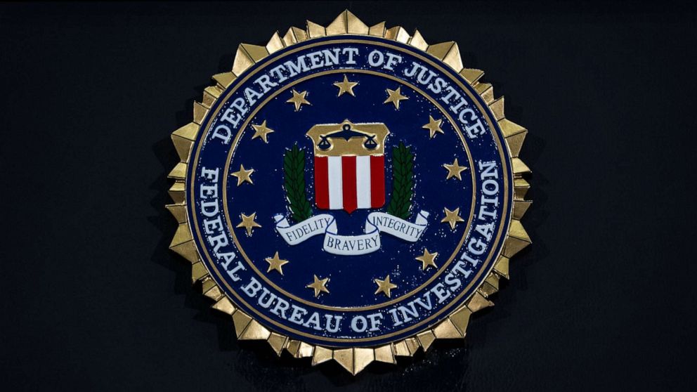 PHOTO: The seal of the Federal Bureau of Investigation hangs on a podium during a news conference at the FBI headquarters, June 14, 2018 in Washington.